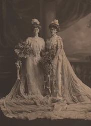 Mrs. Arthur Lee and Miss Faith Moore, American sisters, wearing dress for presentation at the court of Edward VII, c.1905